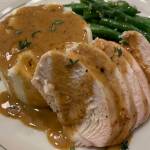 Mashed potatoes are served with chicken breast, green beans and pan sauce. (Photo by Tressa Dale/Peninsula Clarion)