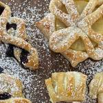 Puff pastry desserts are sprinkled with sugar. (Photo by Tressa Dale/Peninsula Clarion)