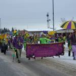 The Krewe of Gambrinus dances down Pioneer Avenue in the 69th Annual Winter Carnival Parade on Saturday, Feb. 11, 2023 in Homer, Alaska. Photo by Delcenia Cosman