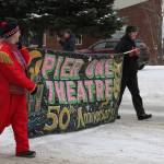 Pier One Theatre members march down Pioneer Avenue in the 69th Annual Winter Carnival Parade on Saturday, Feb. 11, 2023 in Homer, Alaska. Photo by Delcenia Cosman