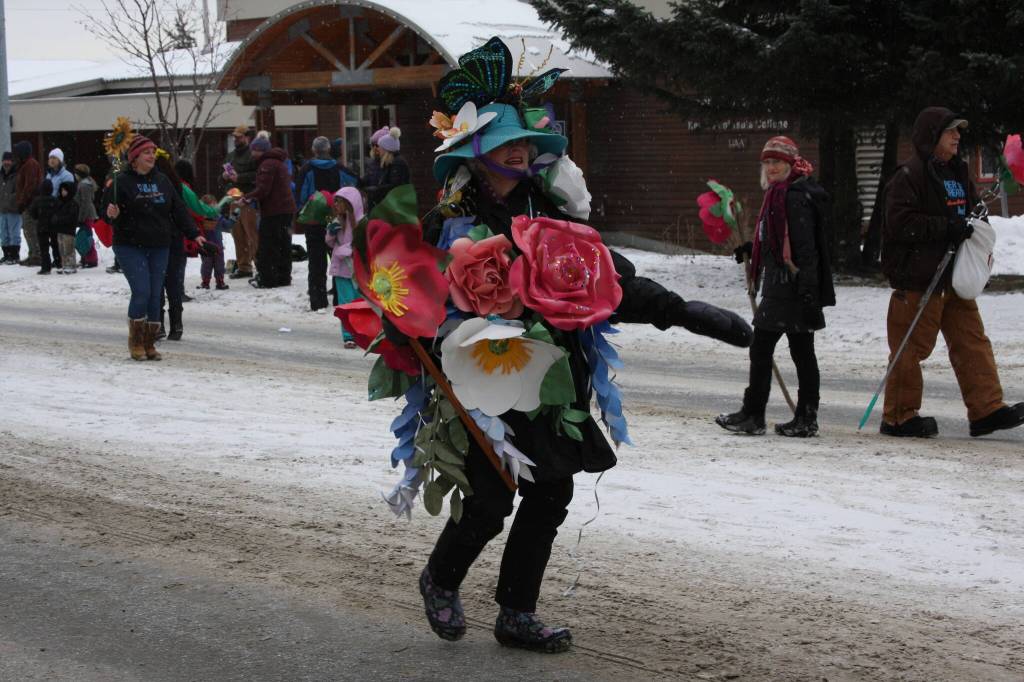 Pier One Theatre members march down Pioneer Avenue in the 69th Annual Winter Carnival Parade on Saturday, Feb. 11, 2023 in Homer, Alaska. Photo by Delcenia Cosman