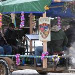 A quartet provides musical accompaniment on the Pier One Theatre float in the 69th Annual Winter Carnival Parade on Saturday, Feb. 11, 2023 in Homer, Alaska. Photo by Delcenia Cosman