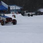 A driver with the Homer Racing Association circles around a plowed track on the frozen Beluga Lake in Homer, Alaska on Saturday, Feb. 11, 2023. Photo by Delcenia Cosman