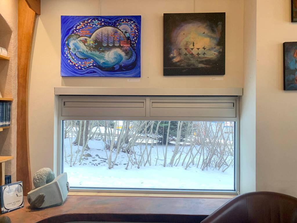 Paintings by Counsel Langley are on exhibit at the Homer Public Library through March, as seen Feb. 11, 2023. (Photo by Christina Whiting/Homer News)