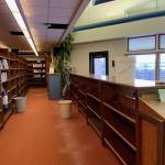 Photo courtesy of Deb Curtis
Bookshelves were moved away from the leaking ceiling in the Homer High School library on Jan. 23.