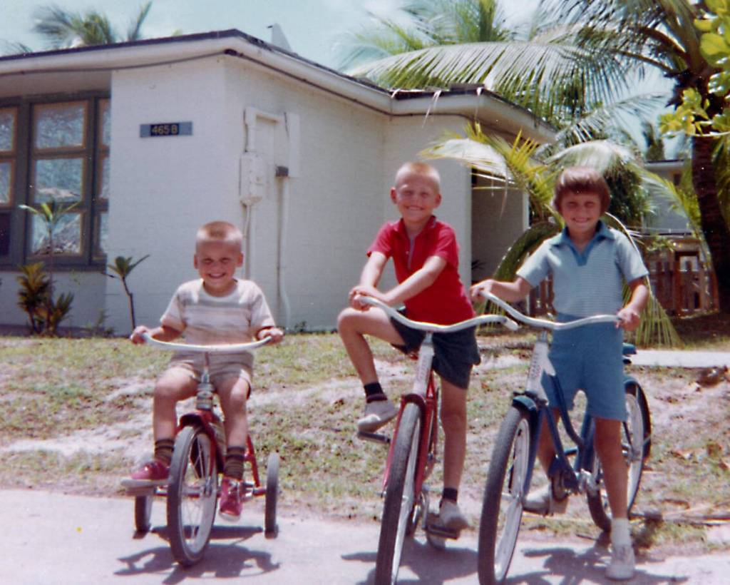Eric Fenger (posed between brother Peter and sister Heidi) called Kwajalein Atoll a paradise for kids. The Fengers lived in this South Pacific locale for about a year, starting in mid-1965. (Photo courtesy of the Fenger Family Collection)
