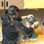 Maddie Cazares mixes pretzel dough during a foods class at Kenai Central High School on Wednesday, Feb. 22, 2023 in Kenai, Alaska. (Ashlyn OHara/Peninsula Clarion)