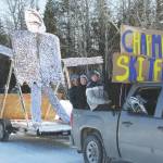 The Chapman ski teams float proceeds down School Street during the Snow Rondi Parade on Saturday in Anchor Point. (Photo by Delcenia Cosman/Homer News)