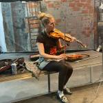 Rachel Nesvig plays Hardanger for dance workshop at Homer High School stage on Tuesday March 7. Photo by Emilie Springer