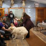 Best manners award winner, Great Pyrenees Bronwyn, says hello to members of the audience with her owner, Julienne Ihly during the Snow Rondi dog show on Sunday, March 5 at the Anchor Point Senior Center in Anchor Point, Alaska. Photo by Delcenia Cosman