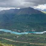 Areas cleared to make way for the Cooper Landing Bypass Project (bottom) can be seen above the Kenai River in Cooper Landing in this Aug. 10, 2021, photo. (Jeff Helminiak/Peninsula Clarion file)