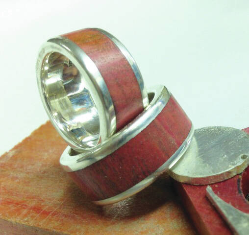 Custom-made wedding bands, sterling silver, Koa wood, 2016, Homer. (Photo by Art Koeninger)