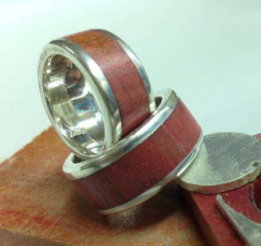 Custom-made wedding bands, sterling silver, Koa wood, 2016, Homer. (Photo by Art Koeninger)