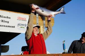 Photo by Michael Armstrong/Homer News
The 28th annual Homer Winter King Salmon Tournament winner Weston Marley holds up the 27.38-pound winter king salmon he caught on Sunday, April 10, 2022, in Kachemak Bay.
