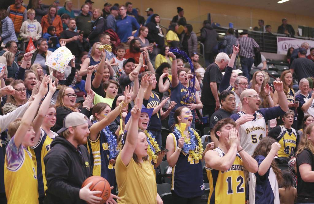 Ninilchik fans celebrate the teams second straight Class 2A boys state basketball championship Saturday, March 18, 2023, at the Alaska Airlines Center in Anchorage, Alaska. (Photo courtesy of Robin Moore)