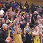 Ninilchik fans celebrate the team's second straight Class 2A boys state basketball championship Saturday, March 18, 2023, at the Alaska Airlines Center in Anchorage, Alaska. (Photo courtesy of Robin Moore)