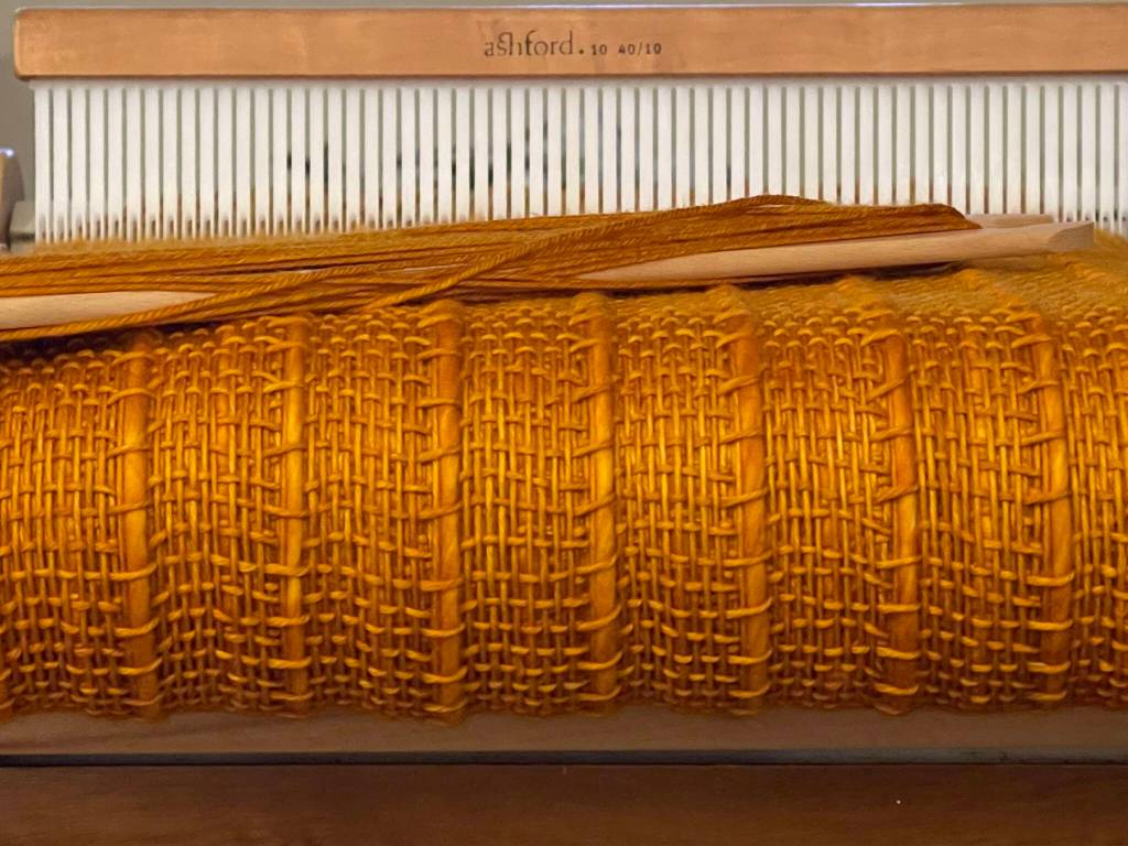 Ray of Sunshine Scarf, handwoven, 100% merino wool, by Lisa Talbott, who will create a similar scarf during Ready Set Art. (Photo provided by Lisa Talbott)