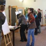Community members share their thoughts on the ongoing housing crisis during the community conversation on housing solutions in the greater Homer area at Christian Community Church on Saturday. Photo by Delcenia Cosman