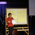 Denali Daniels facilitates the community conversation on housing solutions in the greater Homer area at Christian Community Church on Saturday. Photo by Delcenia Cosman