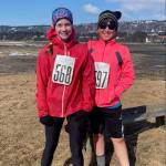 Fischer Spurkland and Boden Green pose before the start of Homer Sea to Ski on Sunday<ins>, April 2, 2023</ins>. (Photo by Emilie Springer/Homer News)