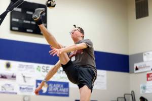 Caleb Evans of team Homer Halibuts tries his best at the one-foot high kick competition during the sixth annual Traditional Games on Saturday at Thunder Mountain High School. Photo by Jonson Kuhn / Juneau Empire