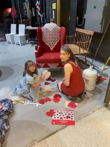 Photo by Emilie Springer/Homer News
Nova Cope and Carla Klinker-Cope work on the Queen of Hearts throne at the Mariner Theater on Saturday<ins>, April 8, 2023, in Homer, Alaska</ins>.