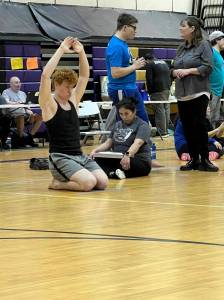 Senior Elijah Gordon competing in the senior division performs the Kneel Jump during the Salamatof Tribe Traditional Native Games Invitational at Kenai Middle School in Kenai, Alaska, on Friday, April 14, 2023. Photo provided by Megan Gordon.