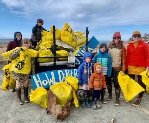 HOWL youth and adults clean Bishops Beach on Earth Day, Saturday<ins>, April 22, 2023</ins>. From left to right, Quinn Blackstock, Kate Crowley, Declan Gaylord, Ellowyn Hansen, Bjarn Hansen, Charlie Mitchell, Jamie Cloud, Ashley Hansen. Photo by Christina Whiting
