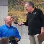 Kenny Leaf, a teacher at Cook Inlet Academy, speaks with Merrill Sikorski at the Caring for the Kenai Awards Celebration held during a Joint Chamber Luncheon on Wednesday, May 3, 2023, at the Soldotna Regional Sports Complex in Soldotna, Alaska. (Jake Dye/Peninsula Clarion)