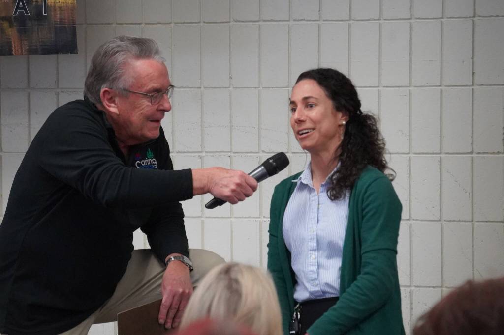 Merrill Sikorski introduces Seward High School teacher Amelia Bagheri at the Caring for the Kenai Awards Celebration held during a Joint Chamber Luncheon on Wednesday, May 3, 2023, at the Soldotna Regional Sports Complex in Soldotna, Alaska. (Jake Dye/Peninsula Clarion)