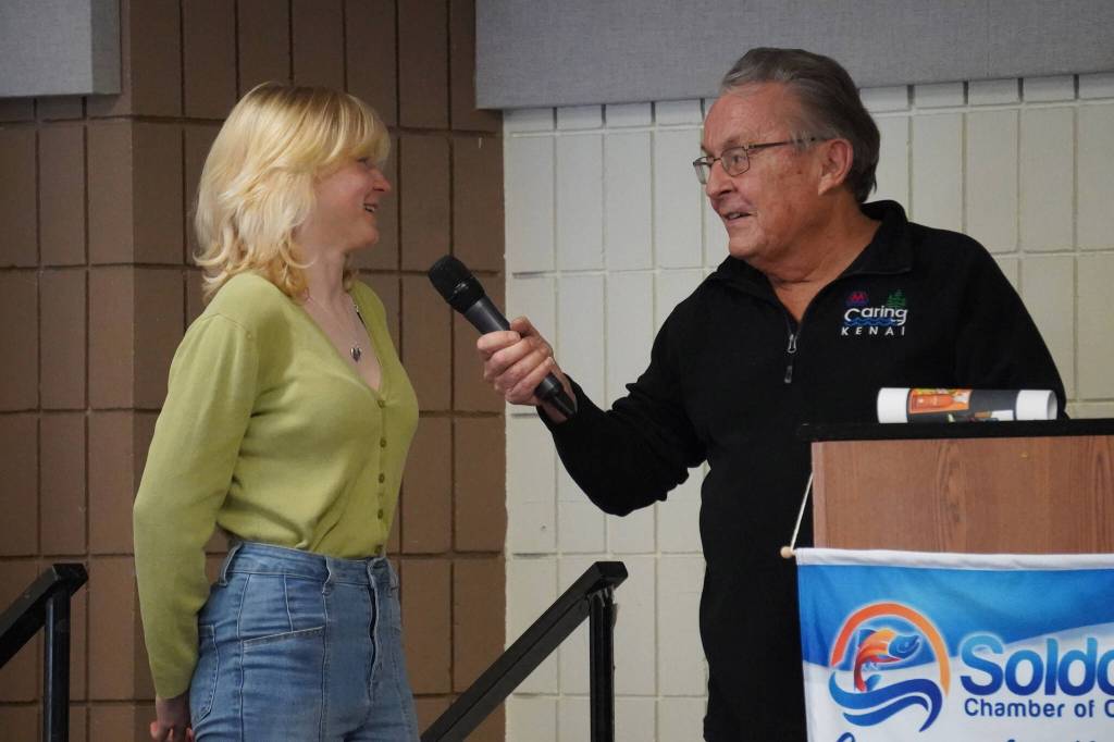 Runner-Up Sophia Jedlicki, of Soldotna High School, is introduced by Merrill Sikorski at the Caring for the Kenai Awards Celebration held during a Joint Chamber Luncheon on Wednesday, May 3, 2023, at the Soldotna Regional Sports Complex in Soldotna, Alaska. (Jake Dye/Peninsula Clarion)