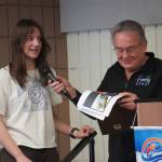 Runner-Up Nova Paulk, of Soldotna High School, is introduced by Merrill Sikorski at the Caring for the Kenai Awards Celebration held during a Joint Chamber Luncheon on Wednesday, May 3, 2023, at the Soldotna Regional Sports Complex in Soldotna, Alaska. (Jake Dye/Peninsula Clarion)