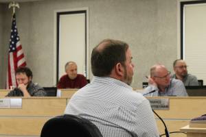 Kenai Peninsula Borough School District Superintendent Clayton Holland, center, addresses the Kenai Peninsula Borough Assembly during a budget work session on Tuesday, March 14, 2023 in Soldotna, Alaska. (Ashlyn OHara/Peninsula Clarion)