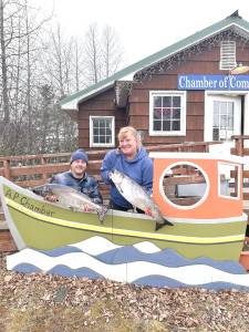 Jesse Pasch (left), winner of the average fish prize in the 28th annual Anchor Point King Salmon Tournament, poses with his fish during weigh-in on Saturday, May 6 at the Anchor Point Chamber of Commerce building in Anchor Point, Alaska. This is Paschs second year of winning average fish. Photo courtesy of Mcki Needham