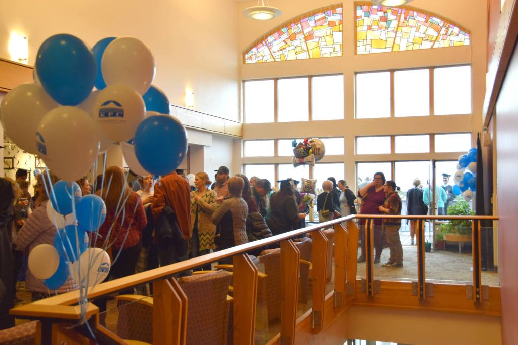 Kachemak Bay Campus faculty, staff and graduates and their family members enjoy a reception gathering in the Pioneer Hall commons after the 2023 KBC Commencement on Wednesday, May 10, 2023, in Homer, Alaska. (Photo by Delcenia Cosman/Homer News)