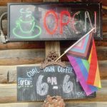 Signs of summer on the Spit include Coal Town Coffee open, May 10.