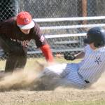 Wasilla third baseman Logan Bean tags out Soldotnas Levi Mickelson on Saturday, May 13, 2023, at the Soldotna Little League fields in Soldotna, Alaska. (Photo by Jeff Helminiak/Peninsula Clarion)
