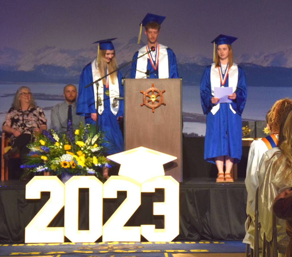 From left: Valedictorians Bristol Johnson, Seamus McDonough and Hannah Stonorov address Homer High School 2023 graduating seniors in the Homer High School’s Alice Witte Gymnasium, May 15, 2023, in Homer, Alaska. (Photo by  Emilie Springer/ Homer News)