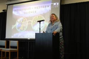Kachemak Bay Writers Conference keynote speaker Robin Wall Kimmerer gives a presentation on Saturday, May 13, 2023 at Kachemak Bay Campus in Homer, Alaska. Photo by Delcenia Cosman