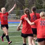 Kenai Central's Kate Wisnewski celebrates making the game-winning penalty kick on Saturday, May 20, 2023, in the championship game of the Peninsula Conference tournament at Justin Maile Field at Soldotna High School in Soldotna, Alaska. (Photo by Jeff Helminiak/Peninsula Clarion)