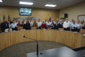 Homer City Council and representatives from the U.S. Coast Guard recognize Homer as a Coast Guard City at Homer City Hall on May 22, 2023. (Photo provided by Homer city manager)