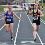 Homers Eryn Field holds off Sitkas Clare Mullin to win the Division II 1,600-meter relay Saturday, May 27, 2023, at the state track and field meet at Palmer High School in Palmer, Alaska.