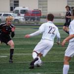 Juneau-Douglas Will Robinson moves to attack the ball, under the control of Soldotnas Zachary Buckbee, during the Division II Soccer State Championship on Saturday, May 27, 2023, at West Anchorage High School in Anchorage, Alaska. (Jake Dye/Peninsula Clarion)