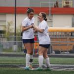 Soldotnas Zayra Poage and Liberty Miller celebrate after Miller scored a goal during the Division II Soccer State Championship on Saturday, May 27, 2023, at West Anchorage High School in Anchorage, Alaska. (Jake Dye/Peninsula Clarion)