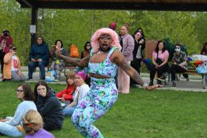 Drag queen Athena Nuff walks through the crowd during a performance at Soldotna Creek Park on Saturday, June 3, 2023 in Soldotna, Alaska. (Ashlyn OHara/Peninsula Clarion)