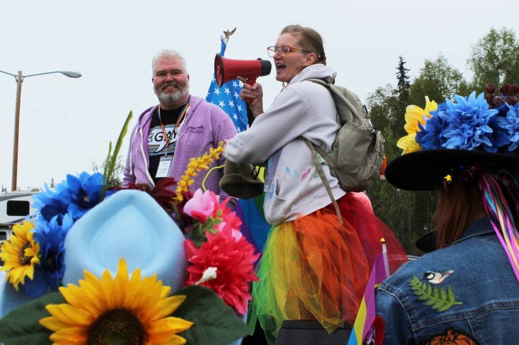 David Brighton (left) and Leslie Byrd (right) prepare to lead marchers from the Soldotna Regional Sports Complex to Soldotna Creek Park as part of Soldotna Pride in the Park on Saturday, June 3, 2023 in Soldotna, Alaska. (Ashlyn OHara/Peninsula Clarion)
