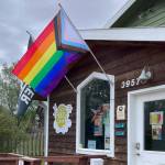 The newly-replaced Pride flags hang in front of the REC Room entrance in June 2023 in Homer, Alaska. Photo by the REC Room