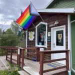 The newly-replaced Pride flags hang in front of the REC Room entrance in June 2023 in Homer, Alaska. Photo by the REC Room