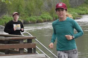 Anchorage's Carrie Setian leads Soldotna's Jenny Neyman in the Tsalteshi Backyard Ultra on Friday, June 9, 2023, along the Kenai River in Soldotna, Alaska. Setian won the event. (Photo by Jeff Helminiak/Peninsula Clarion)