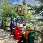 Visitors enjoy coffee and treats along a boardwalk on the Homer Spit on Wednesday, June 14, 2023 in Homer, Alaska. Photo by Christina Whiting